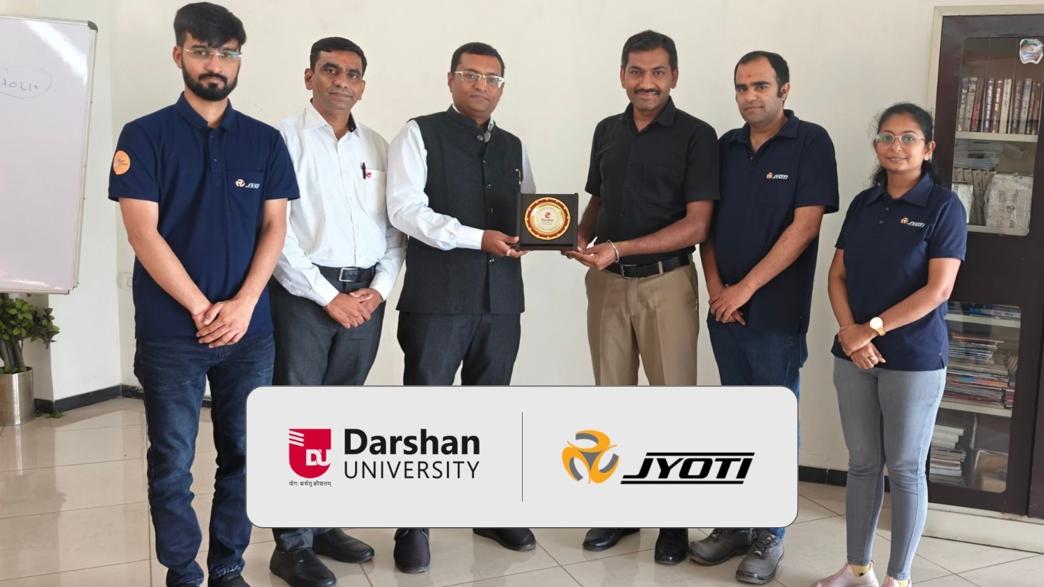 Photos of DU signs MoU with Jyoti CNC Automation Ltd. to enhance student industry exposure.