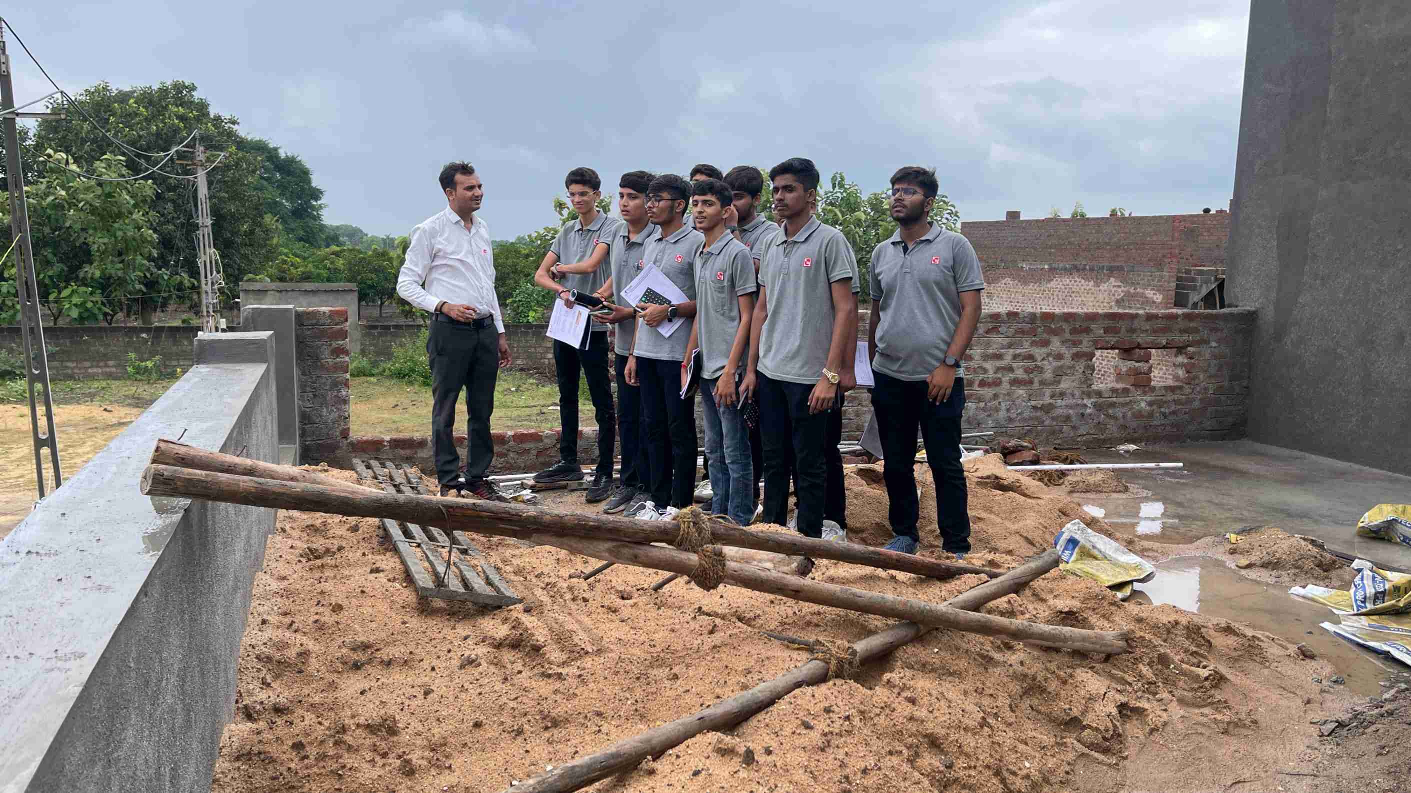 Photos of 1st semester diploma in civil engineering students visited construction site near Hadala village