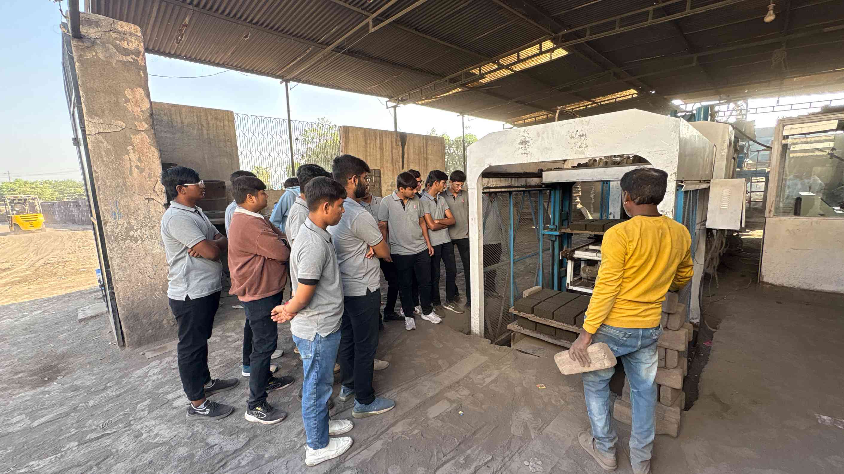 Photos of 1st semester diploma in civil engineering students visited fly ash brick plant 
