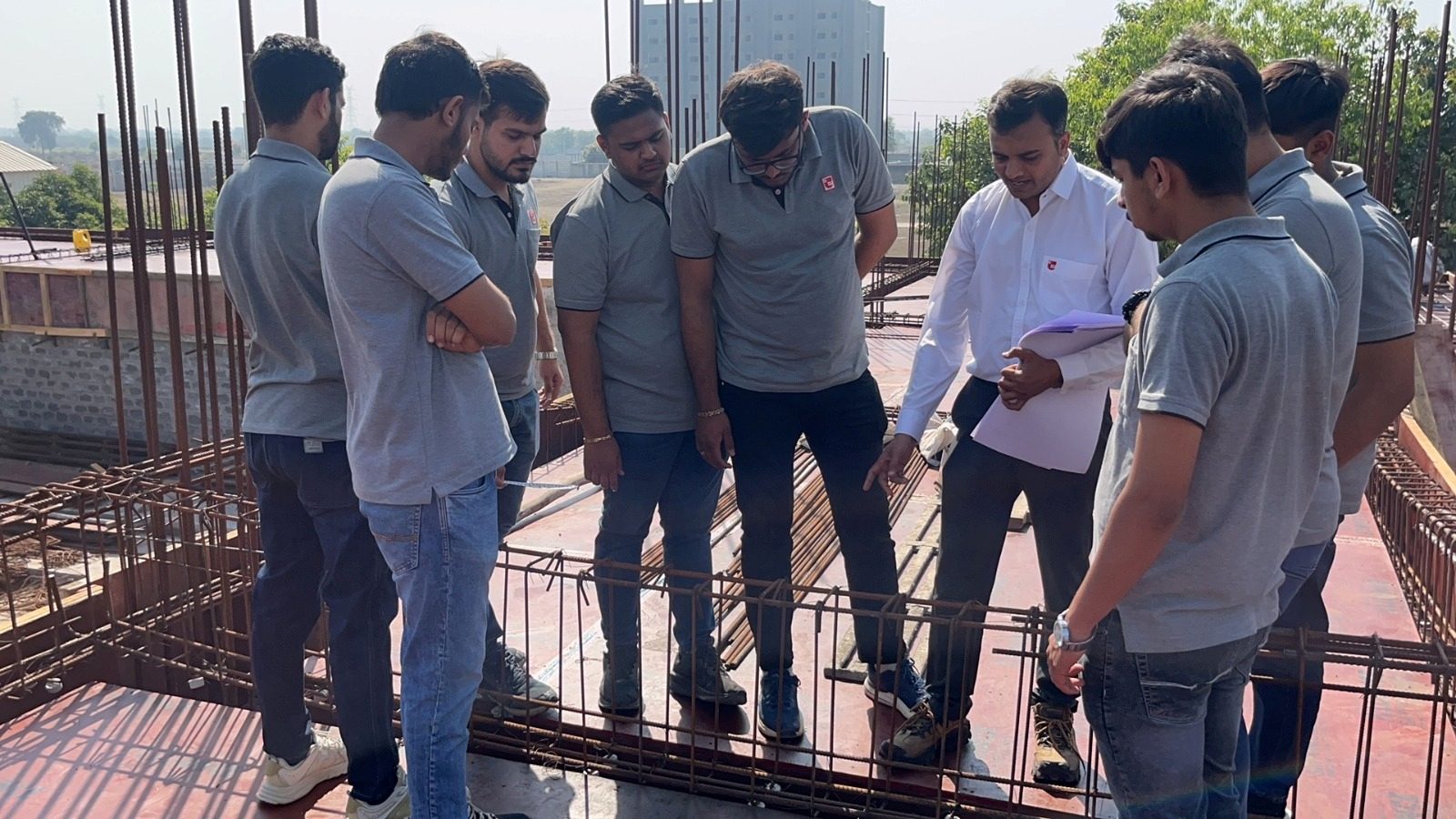 Photos of 6th semester students of diploma civil engineering visited construction site at darshan university